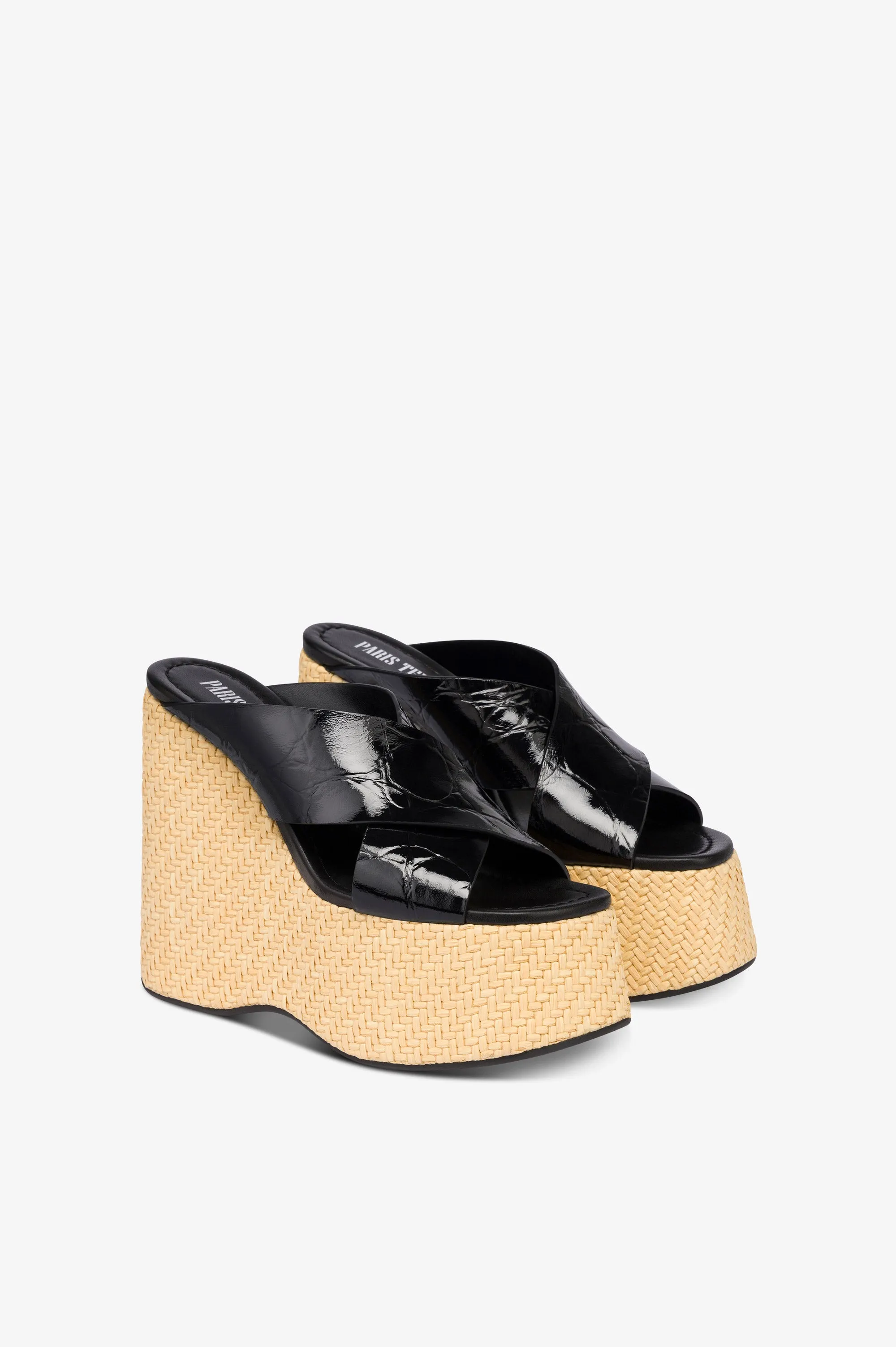 Mules in black patent leather