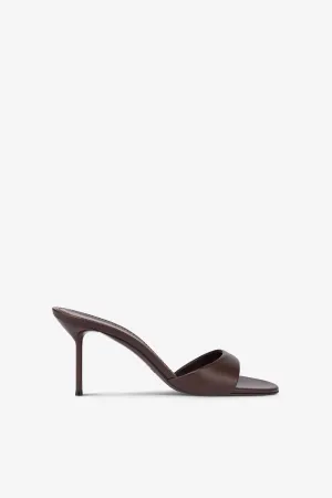 Mules in ebony leather